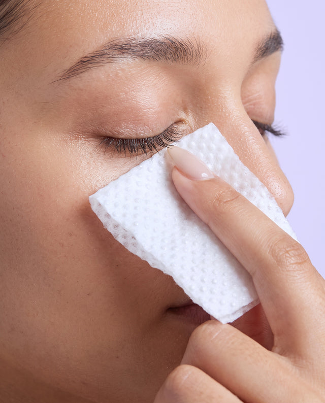 Close-up of a REALief eyelid wipe being swept along the lash line